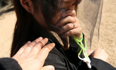 While grieving for her late husband, Miho Sonoda, a Japanese woman, touches herself with fondness.