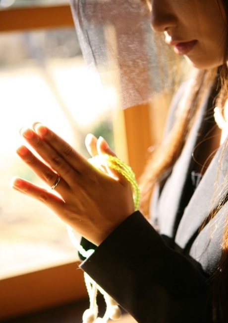 Grieving: Japanese widow Miho Sononôda (L) fondles herself after her husband's passing.