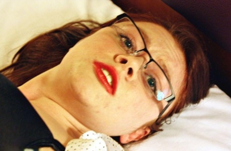 Cleaving the natural redhead on a bed is common as she remains tied up in her clothes.