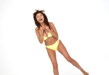 Pretty Japanese Redhead Yoko Matsugane Models A Yellow Bikini In Bare Feet
