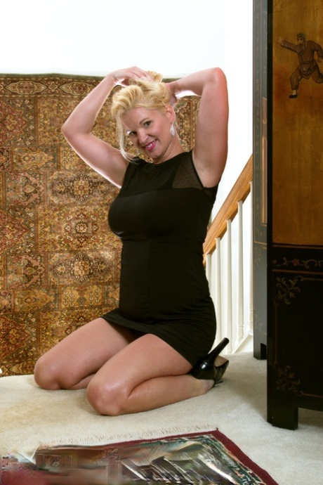 Over 30 blondes, including April Key who has recently revealed her large breasts, playfully engage in playing with her pussy.