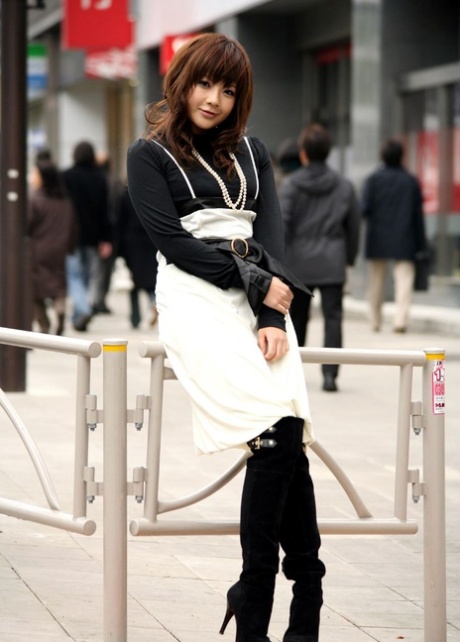Inside and outside, a cute young girl named Kurara from Japan models herself without clothing on.
