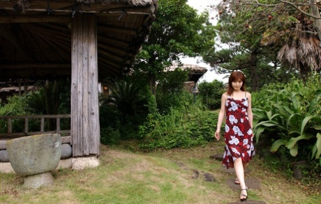 The naked shoot features Japanese redhead An Naba sampling street food before her solo shoot.