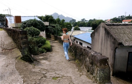 During her home stay, young Japanese girl is stripped down to her nude for impressive solo poses.