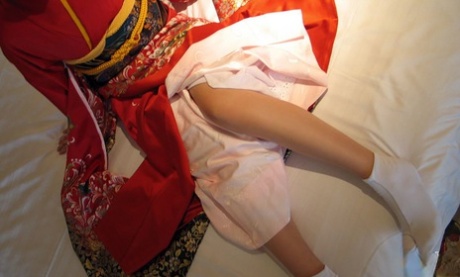 Japanese teen doffs traditional clothing before a facial cumshot and showering