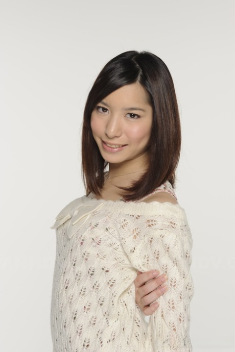 A pair of upskirt panties, a denim skirt and OTK socks are worn by Kurara Makise, a Japanese girl.
