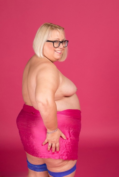 With stockings and glasses on, Lexie Cummings models are pictured in blonde, fat, and topless.