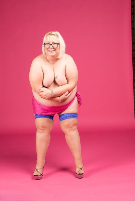 The model, named Lexie Cummings, is a blonde who is fat and appears to be wearing glasses and stockings without a top.