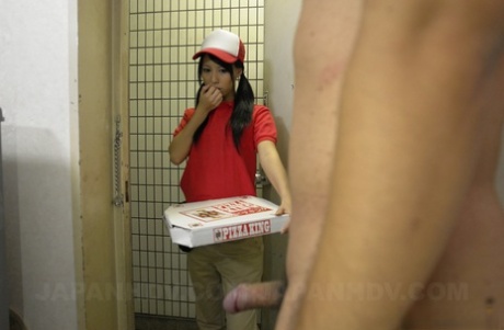 Japanese pizza delivery girl, Miku Oguri, greets her new door with a loud hello.