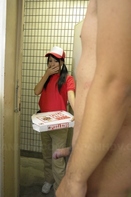 Miku Oguri, the Japanese pizza delivery girl arrives with a rude greeting as she walks through the door.