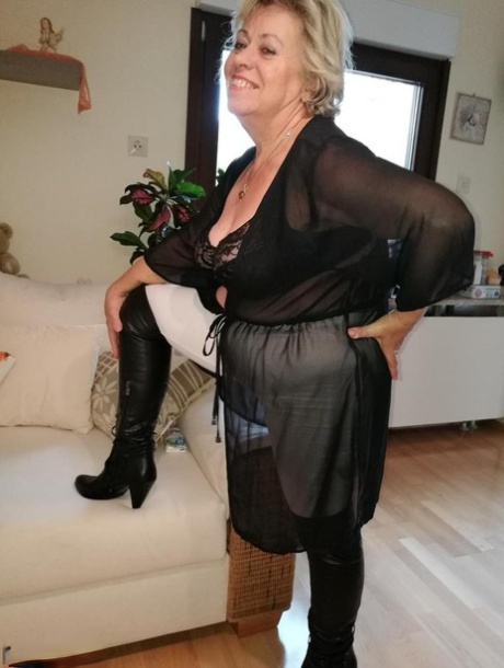 Proving she has snatched is amateur-fatty Caro who removes her OTK boots and white hose.