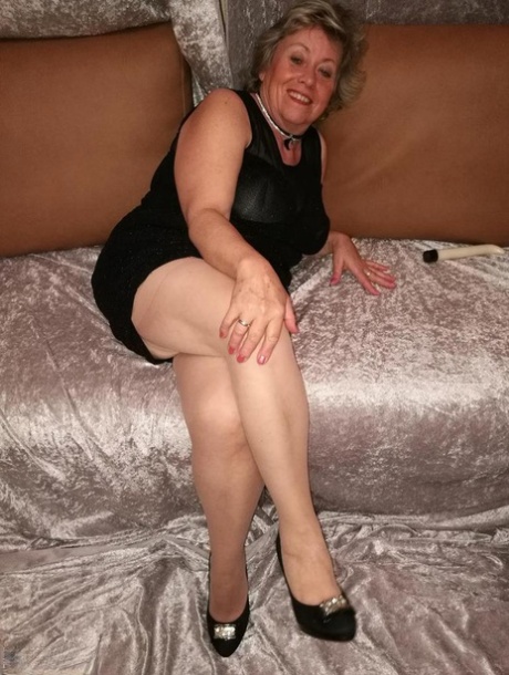Horny Granny Caro Hikes Up Her Dress To Masturbate In Nylons And Heels