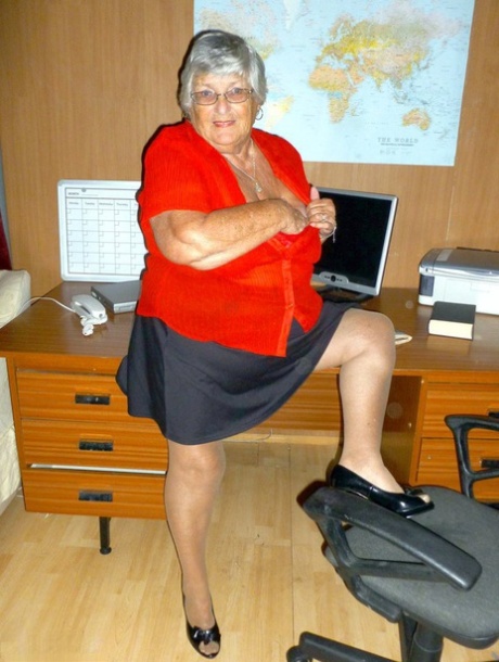 Obese British individual Grandmother Libby is seen in a naked state on the computer desk.