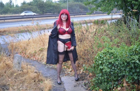 Mature Redhead Barby Slut Gets Naked In Public Places On A Wet Day