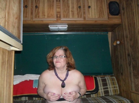 With nipple clamps on her cleavage, Misha, an amateur pumper, enjoys masturbation in the comfort of her motorhome.