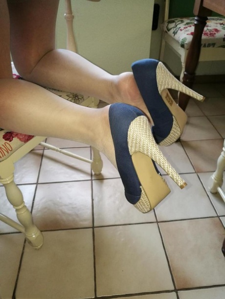 Old Woman Caro Pulls Down Her Pantyhose In High Heels At Kitchen Table