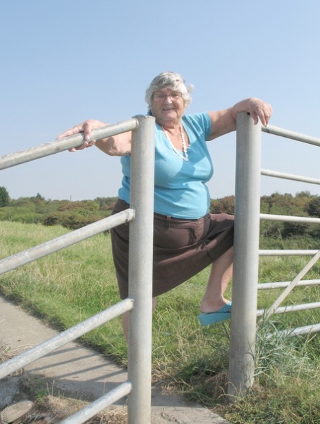 Fat woman Grandma Libby exposes herself on an empty bike path.