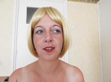 Kat Lara, a blonde amateur, loses her ample natural breasts due to an overexertive bra.