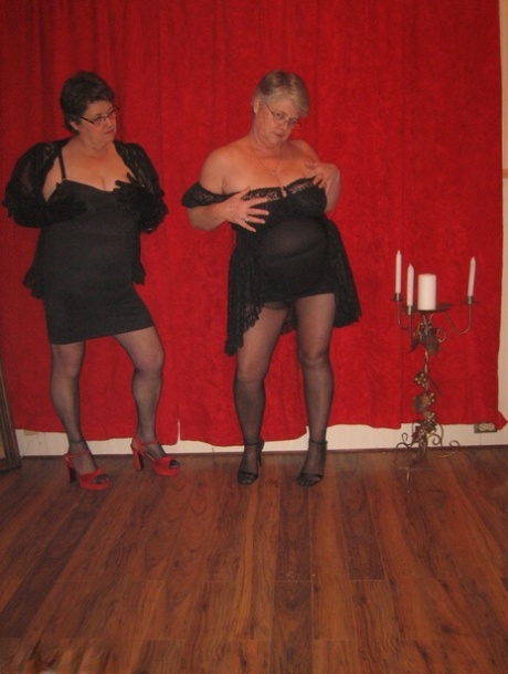 Girdle Goddess and her lesbian partner wear strapon cocks.