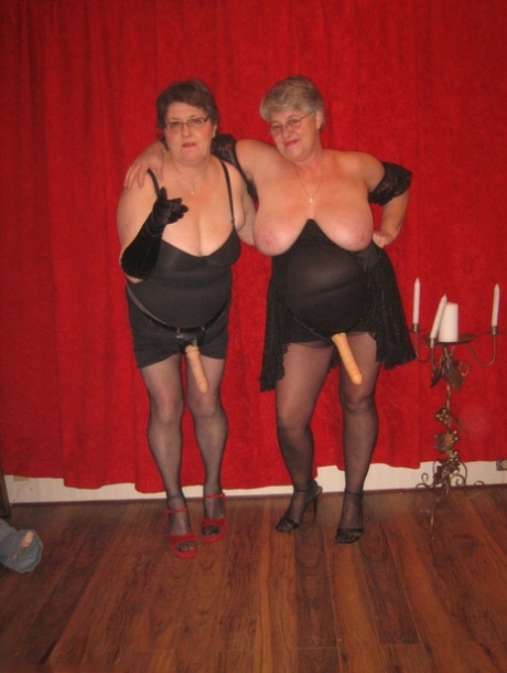 Sadie (Big titted granny) and her lesbian partner wear band-aids while performing magic on the big tittered granny.