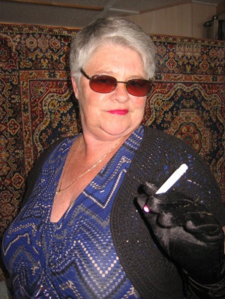 Fat granny girdle goddess is seen wearing shades, gloves and pantyhose without clothing.