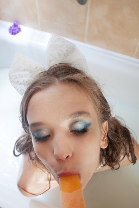 Tiny Teen Girl Alisabelle Pours Milk Over Her Naked Body While Taking A Bath