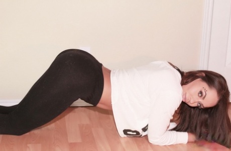 Adorable: Pretty brunette Cindy Cupcakes strips pretty stripty white socks for effect.