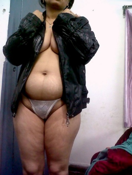 Fat Indian Woman Hides Her Face While Adorned In A Bra And Thong
