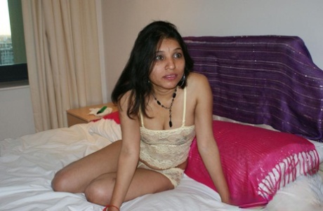MILF Kavya Sharma, an Indian actor, goes completely naked before engaging in sexual activity with a sexy toy.