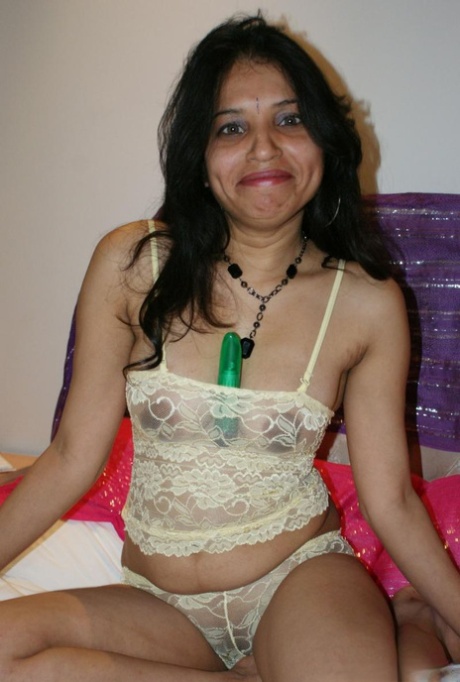 Prior to masturbating with a sexy, MILF Kavya Sharma from India is stripped down and naked.