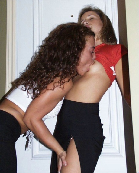 In the midst of being seduced for a lesbian event, amateur girls give a tongue kiss before undressing.