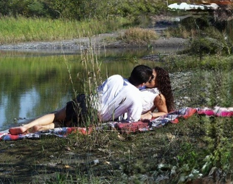 This horny couple has an MMF sexual encounter with one of his hikers near the water.