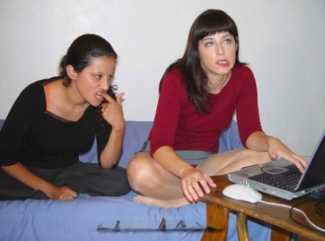Latina lesbians engage in sexual activity while stripping for sex, engaging in oral sex and sucking each other.
