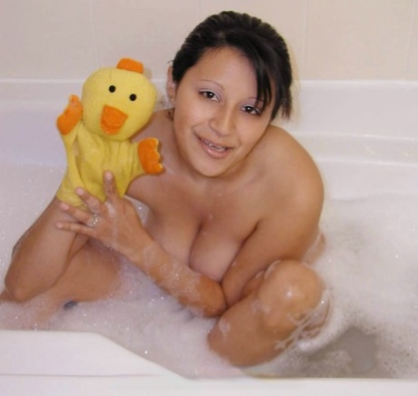 Big Titted Latina Girl Sucks And Rides A Suction Dildo While Bathing