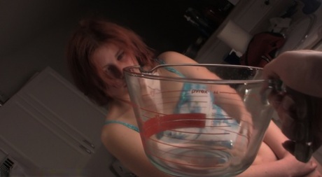 Young babe drinking her own pee in the bowl