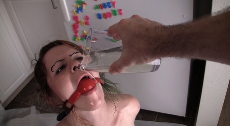 Ball gags are removed by nude white girls before they consume their poop.