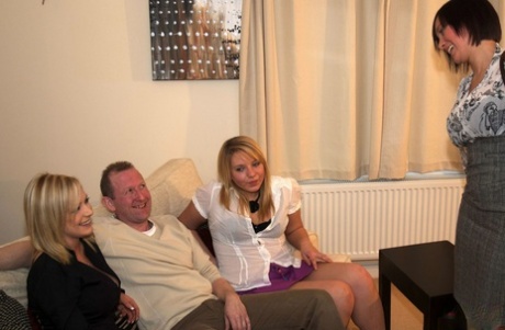 Women in revealing attire massage the nude man's vagina after consuming a few drinks.