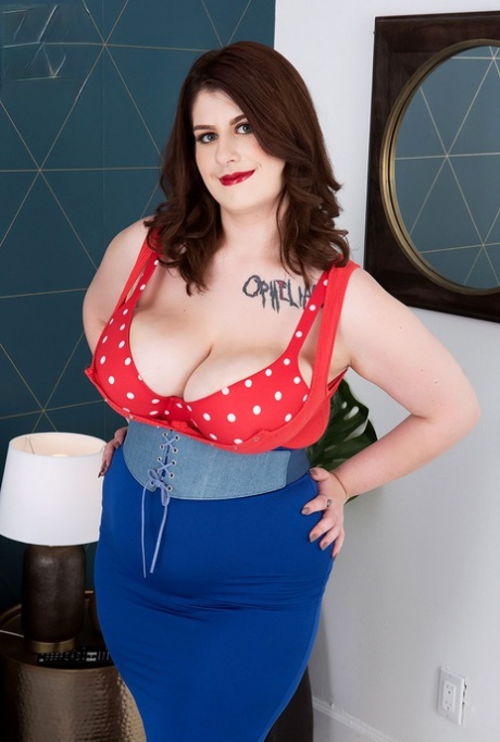 As an overweight girl, Veronica Bow wears her huge tits and plays with her undressing clothes while being alone.