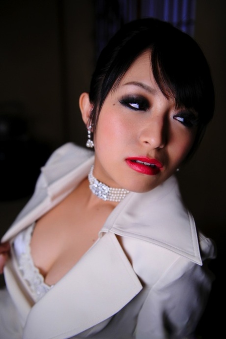 Japanese Model Exposes Her High End Brassiere In A Business Suit And Red Lips