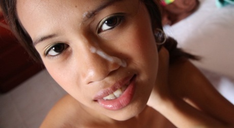 During an oral delivery, the tender Asian amateur puts on a showy face with POV.