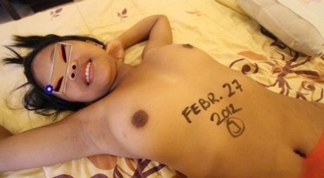 In the middle of a bed with fertile eggs on her face, an Asian girl with firm tanning sensations ends sexual activity.