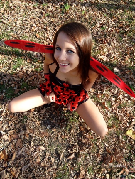 Charming Young Girl Andi Land Exposes Her Tits While Wearing A Costume