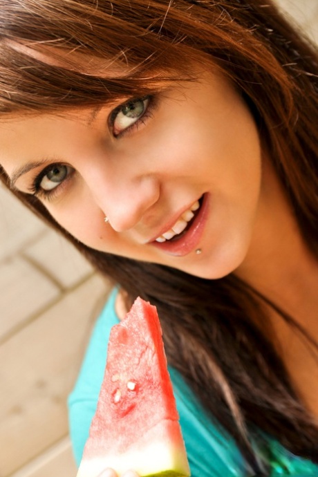 Sweet Teen Andi Land Eats Watermelon In A Tempting Manner