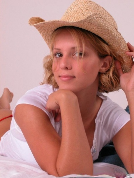 Young Blonde Karen Covers Up Her Naked Breasts With A Straw Hat In SFW Action