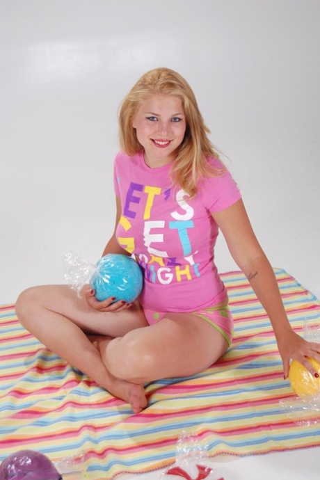 Sweet blonde teen Gemini displays her great body during a solo engagement