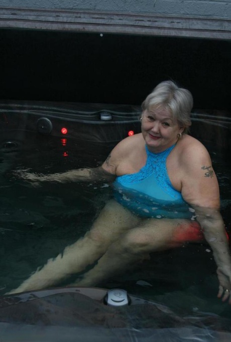 Old Amateur Frees Tits And Twat From Tight Dress Before Getting In Hot Tub