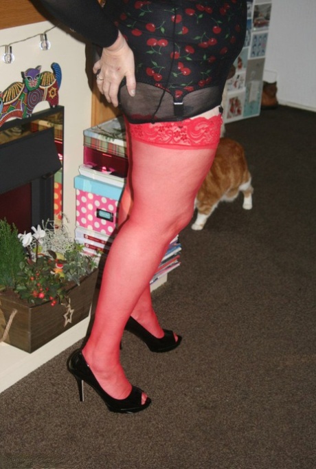 Old Woman Models Her New Red Stockings In See Thru Clothing And Heels