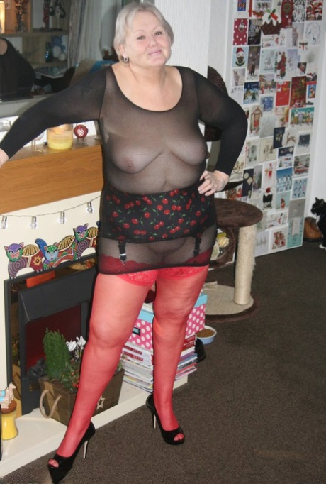 Old Woman Models Her New Red Stockings In See Thru Clothing And Heels