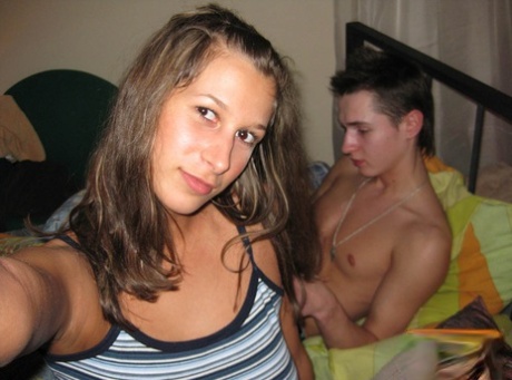 Before a doggystyle sexual encounter, college students exchange oral sex during selfshot action.