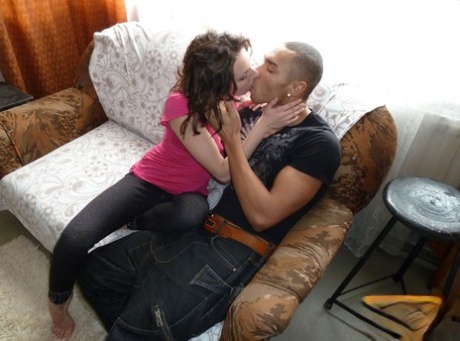 Caucasian teen kisses a black boy before oral and vaginal sex takes place